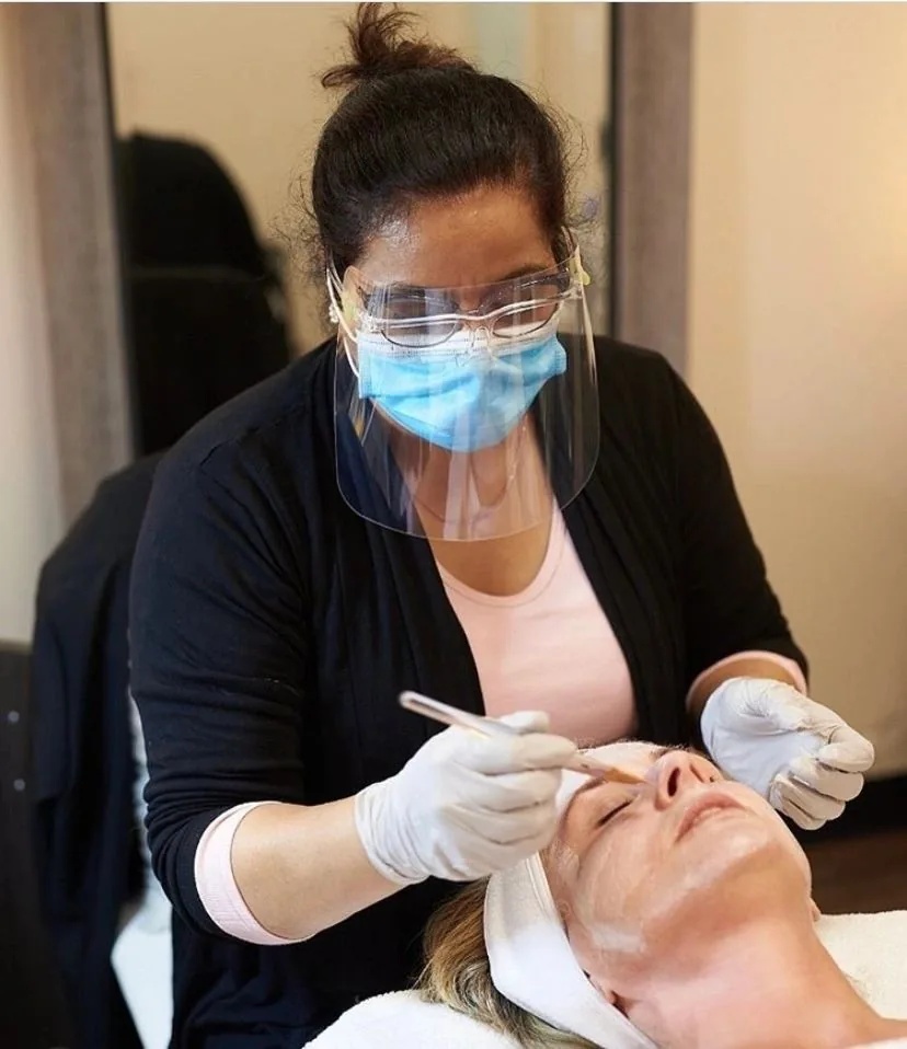 Facial mask brush application during a customized facial