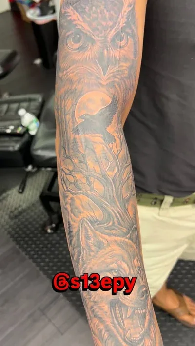 Black and grey sleeve tattoo in progress