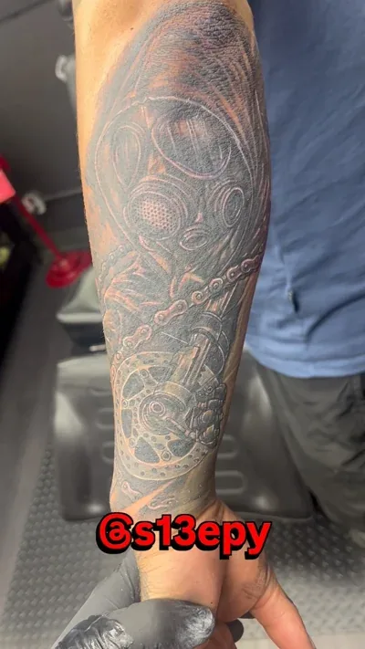 Biker-themed cover-up tattoo